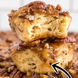close up shot of Caramel Pecan Cinnamon Rolls stacked on top of each other