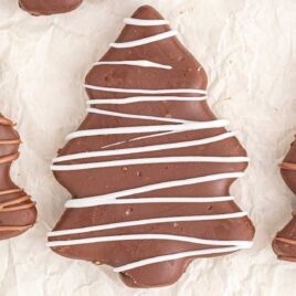 close up overhead shot of Chocolate Peanut Butter Christmas Trees on parchment paper