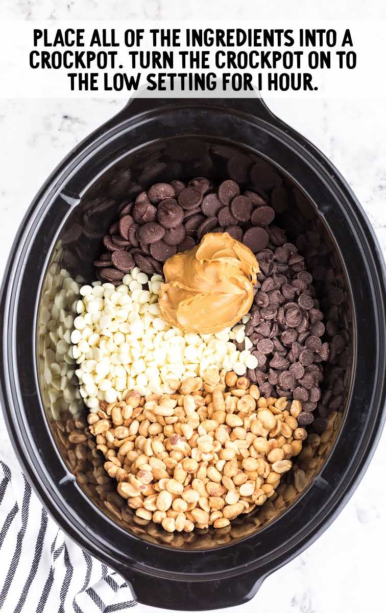 Chocolate Peanut Clusters process shot of ingredients in a crockpot
