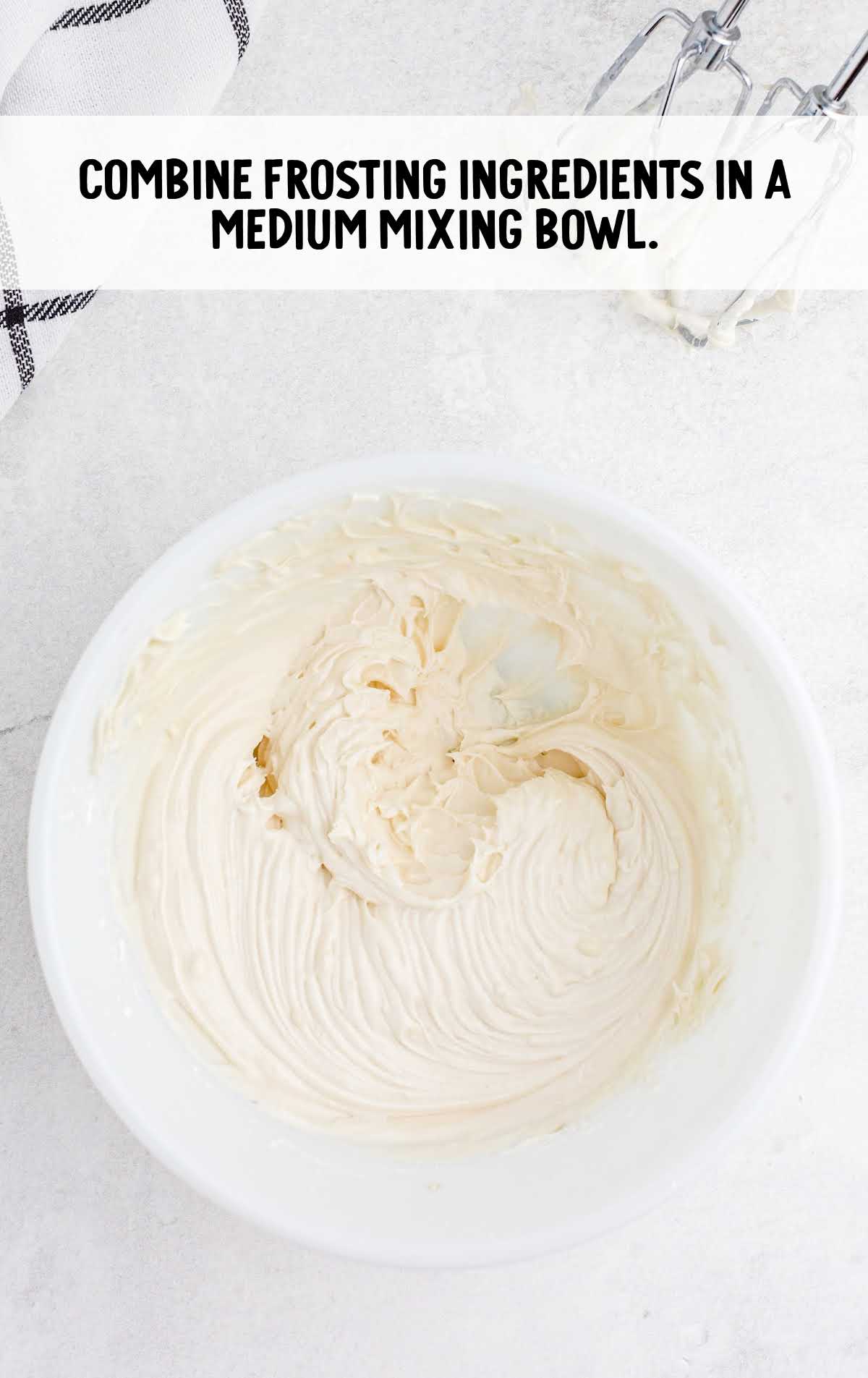 Cinnabon Cinnamon Rolls process shot of frosting ingredients combined in a bowl
