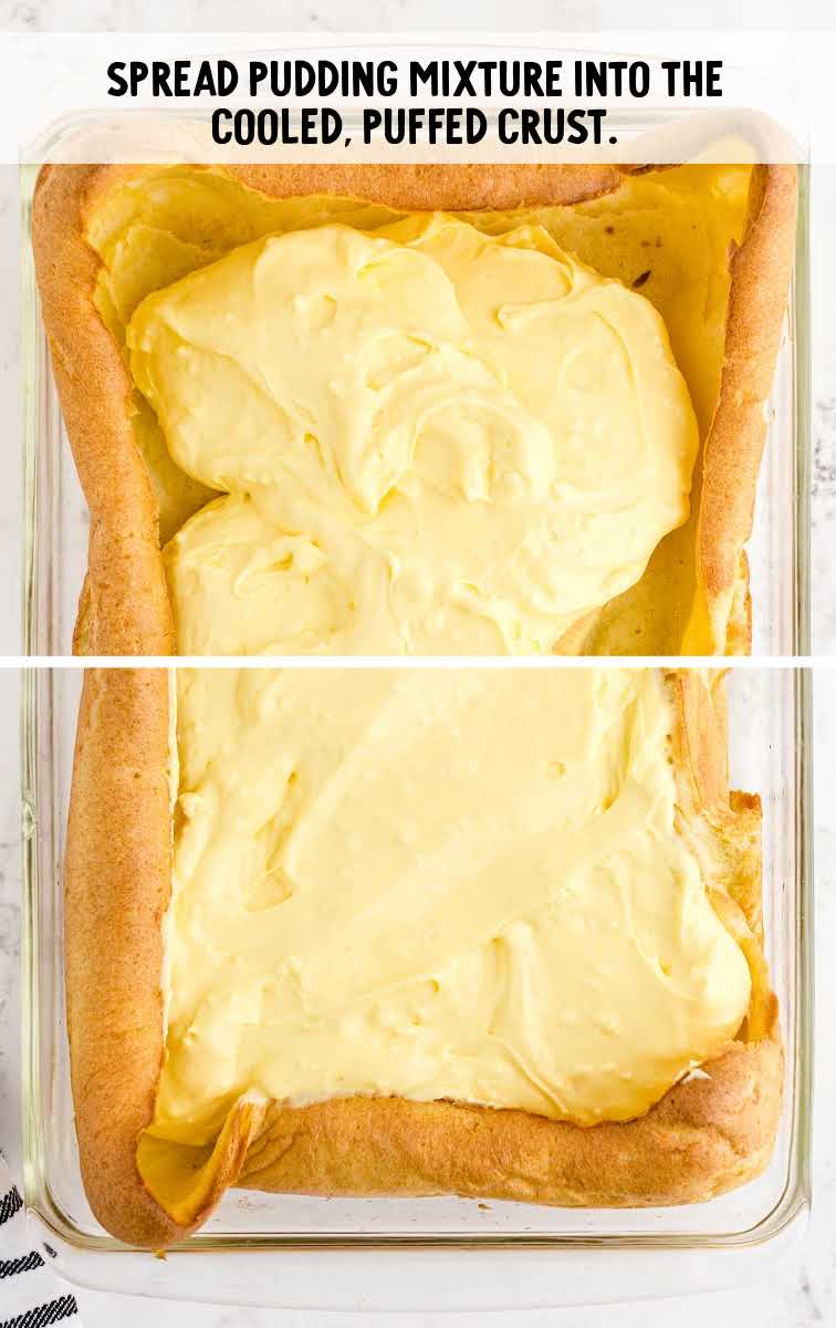 Cream Puff Dessert process shot of pudding mixture spread on top of crust