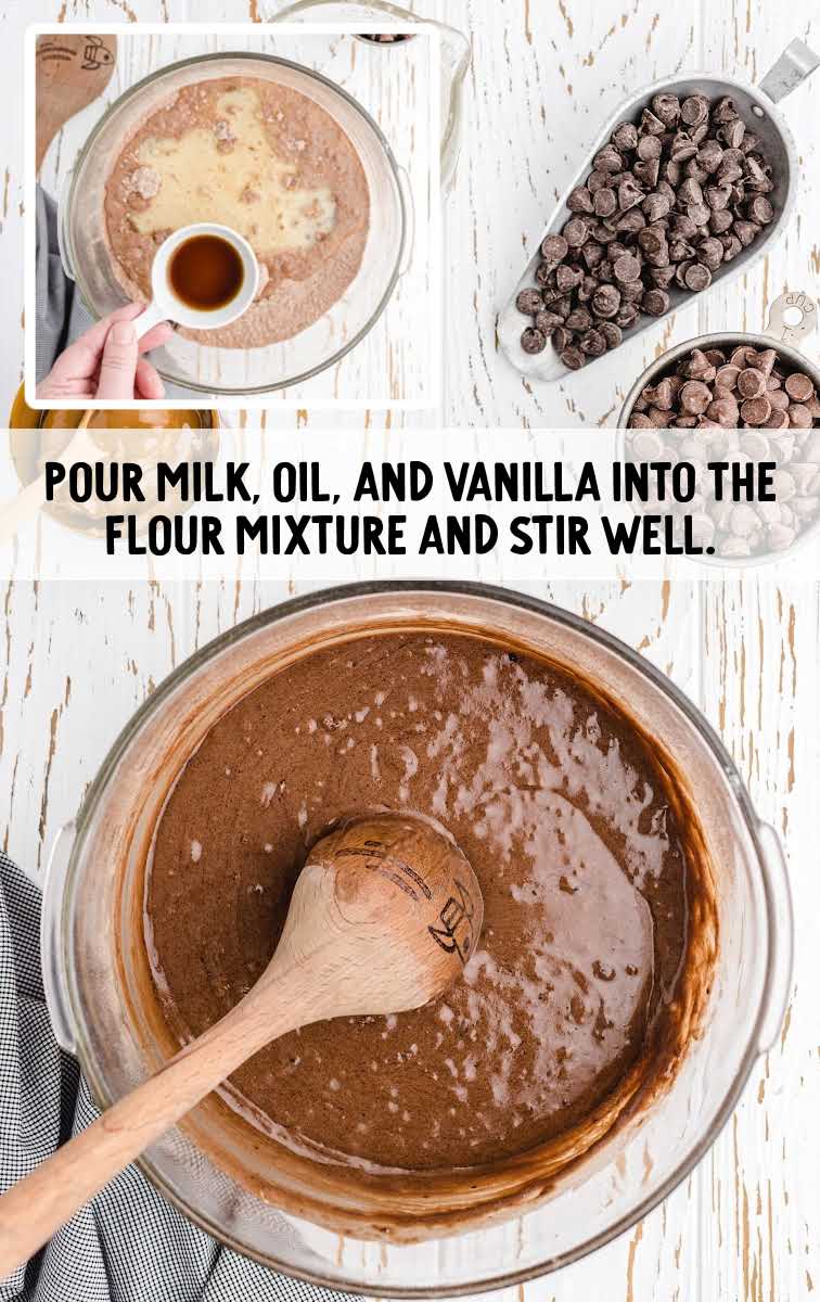 milk, oil, and vanilla poured into the flour mixture