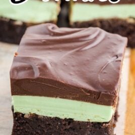 close up shot of slices of Mint Chocolate Brownies on a wooden board