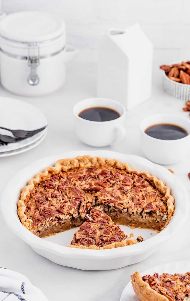 Pecan Pie in a baking dish with slices missing