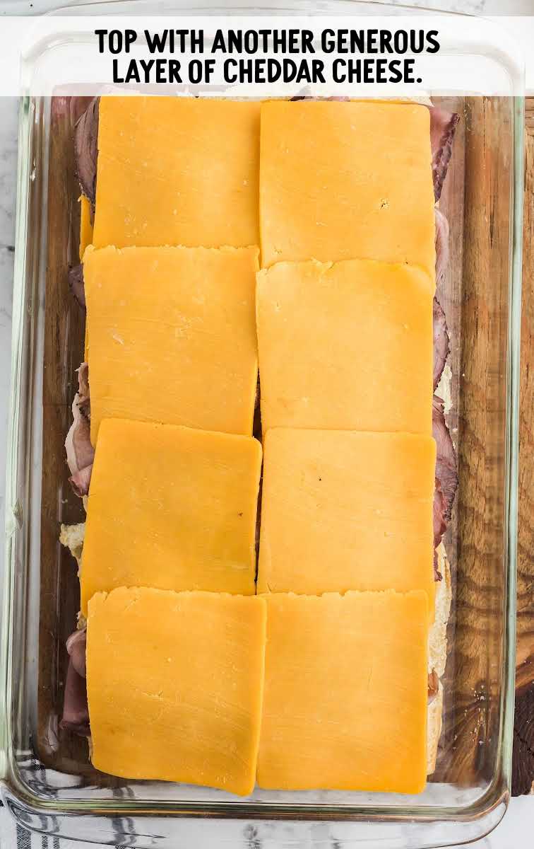Roast Beef Sliders process shot of cheddar cheese placed on top of roast beef