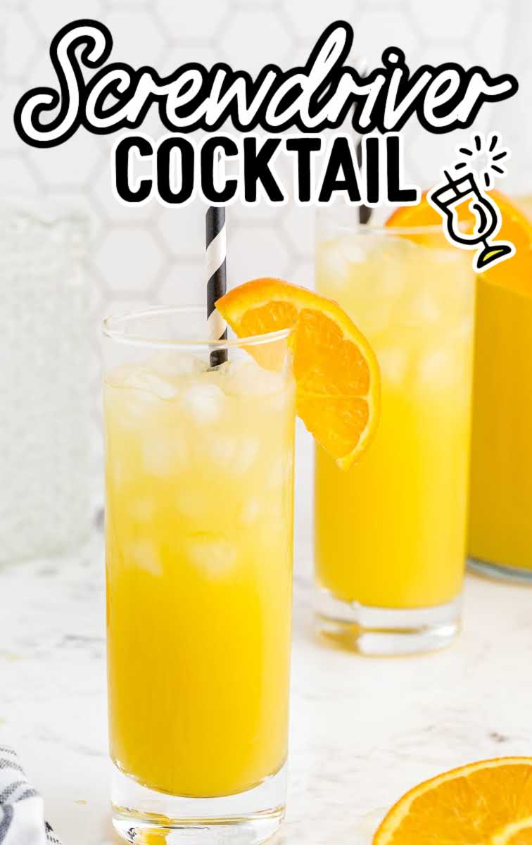 close up shot of glasses of Screwdriver Drink garnished with slices of oranges and served with a straw