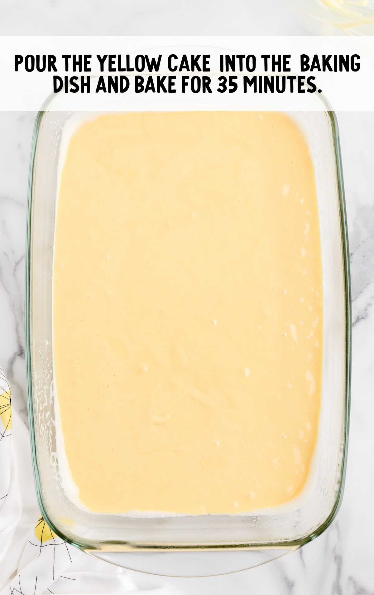 yellow cake mix added to a baking dish