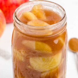 close up shot of a jar of apple pie filling