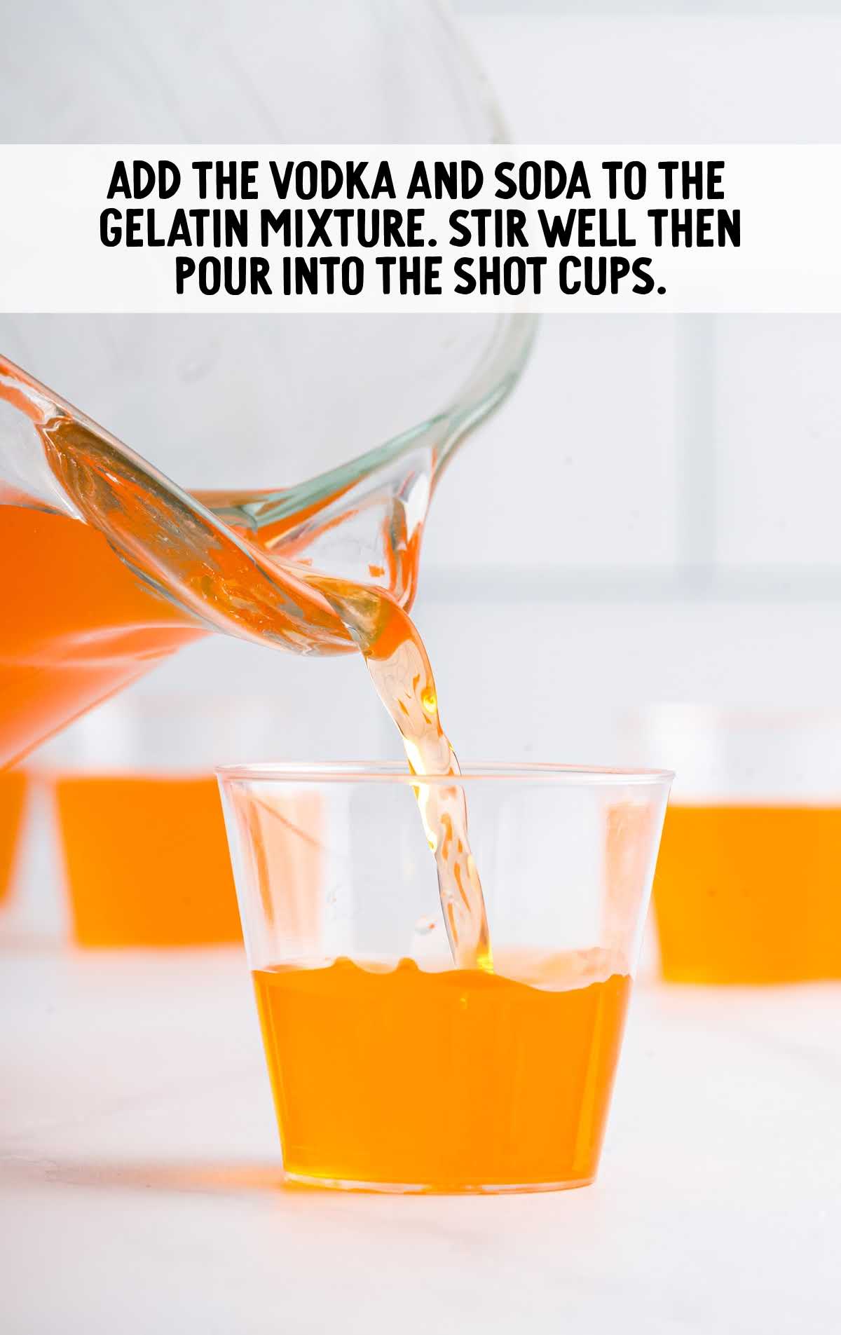 Creamsicle Jello Shot process shot of vodka and soda added to the gelatin mixture then poured into the shot cups