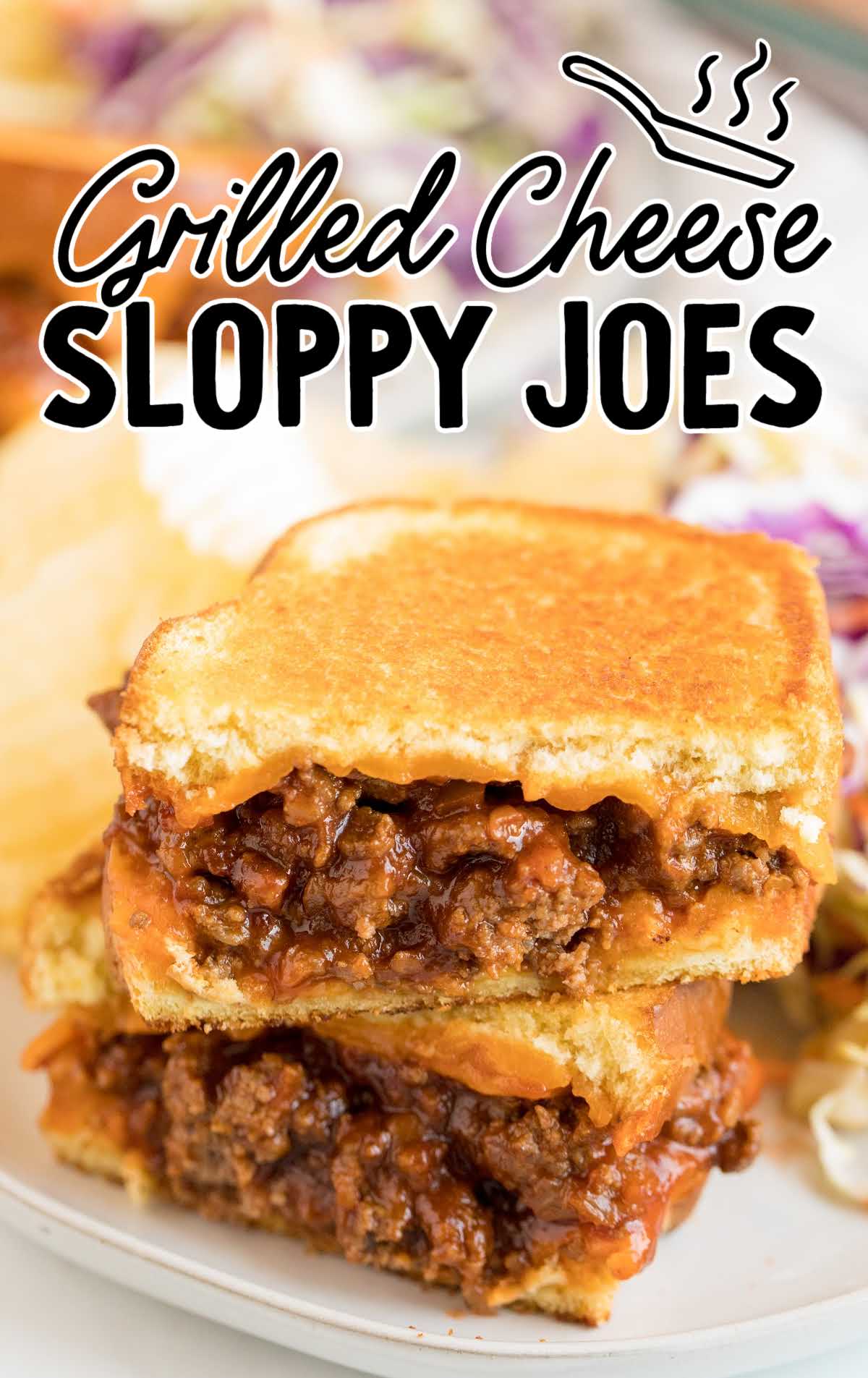 close up shot of Grilled Cheese Sloppy Joes served with chips and coleslaw on a plate
