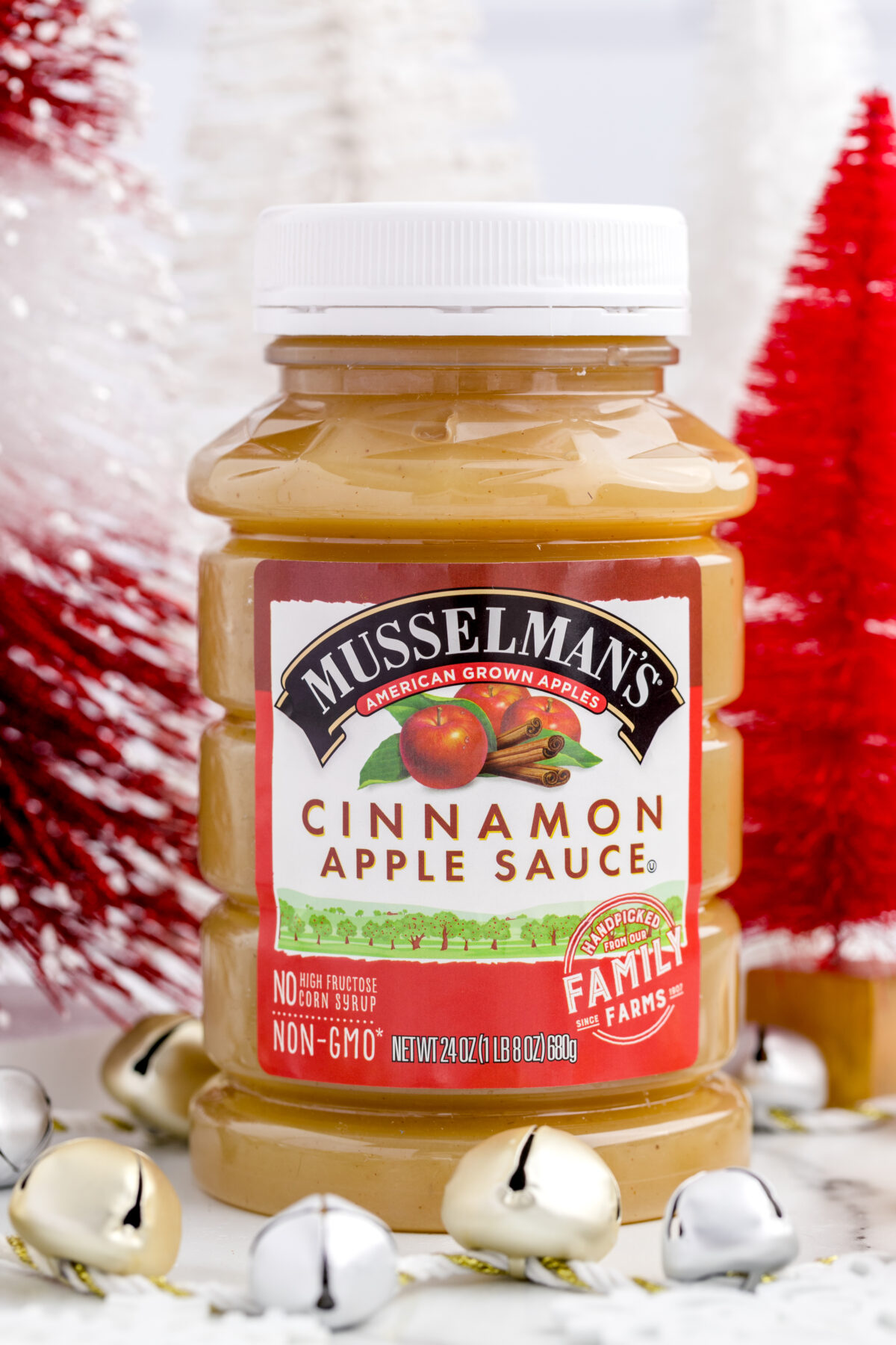 close up shot of a jar of muscleman's cinnamon apple sauce for the applesauce cookies