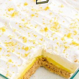 close up shot of a baking dish of No-Bake Lemon Pie garnished with lemon peel