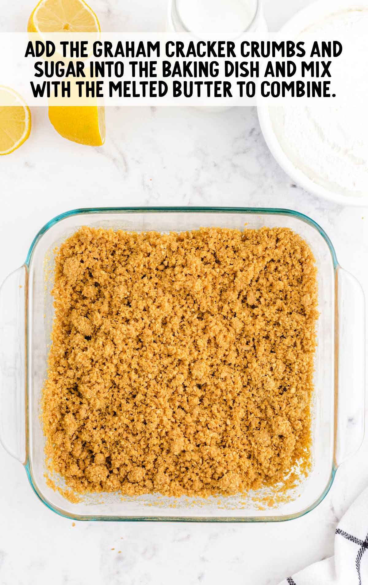 graham crackers crumbs and sugar added to the baking dish