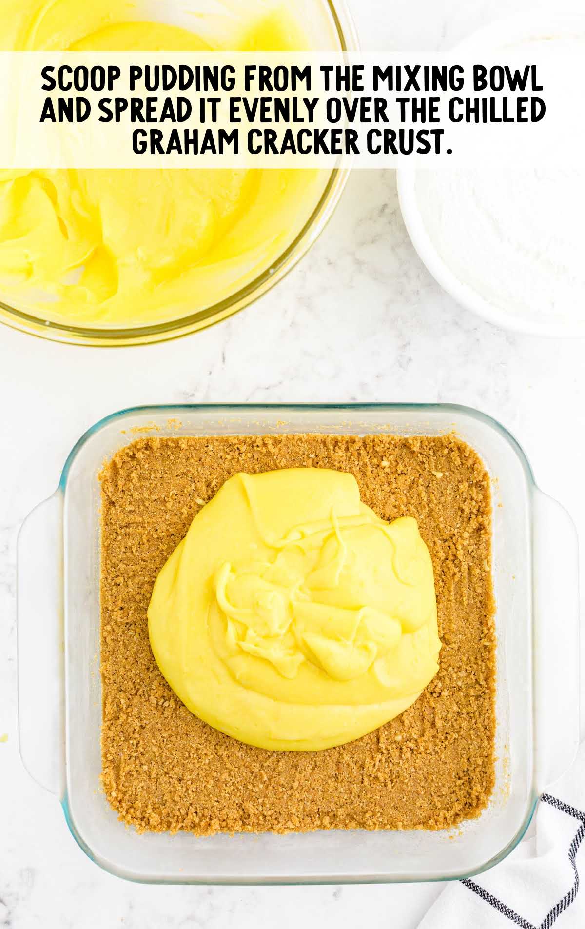 pudding mixture spread over the graham cracker crust