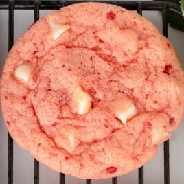 close up shot of Strawberry Cake Mix Cookies on a cooling rack