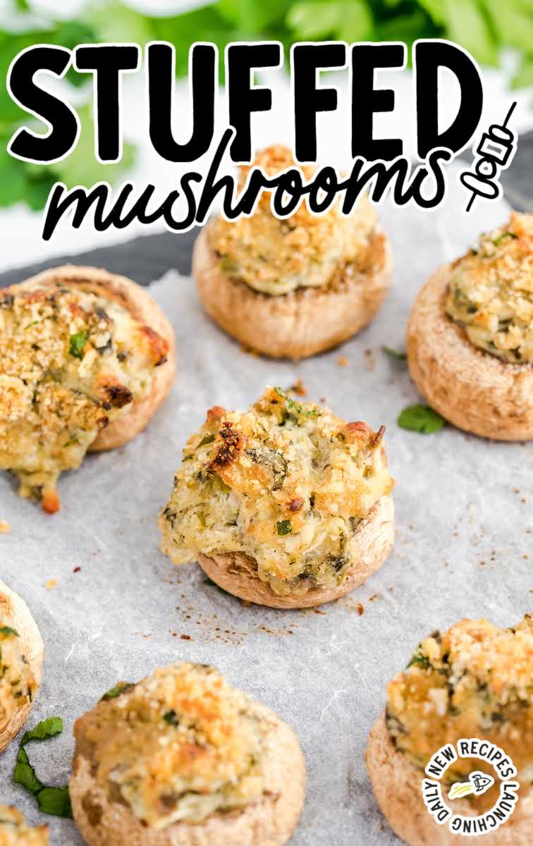 close up shot of a board of Stuffed Mushrooms garnished with parsley