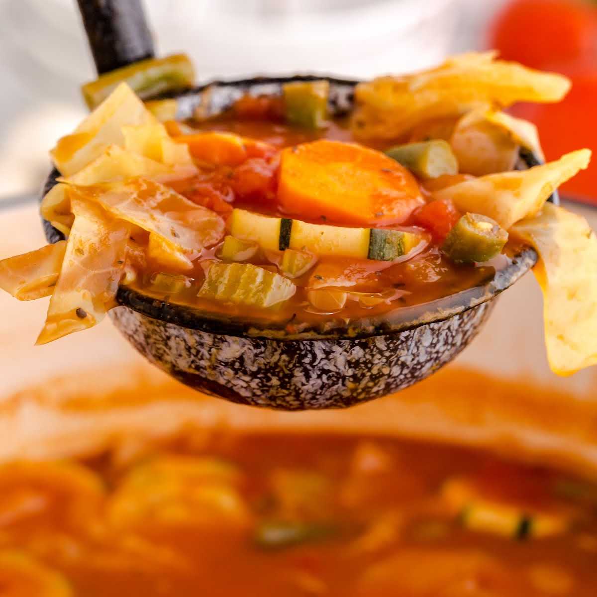 close up shot of a spoonful of Cabbage Soup