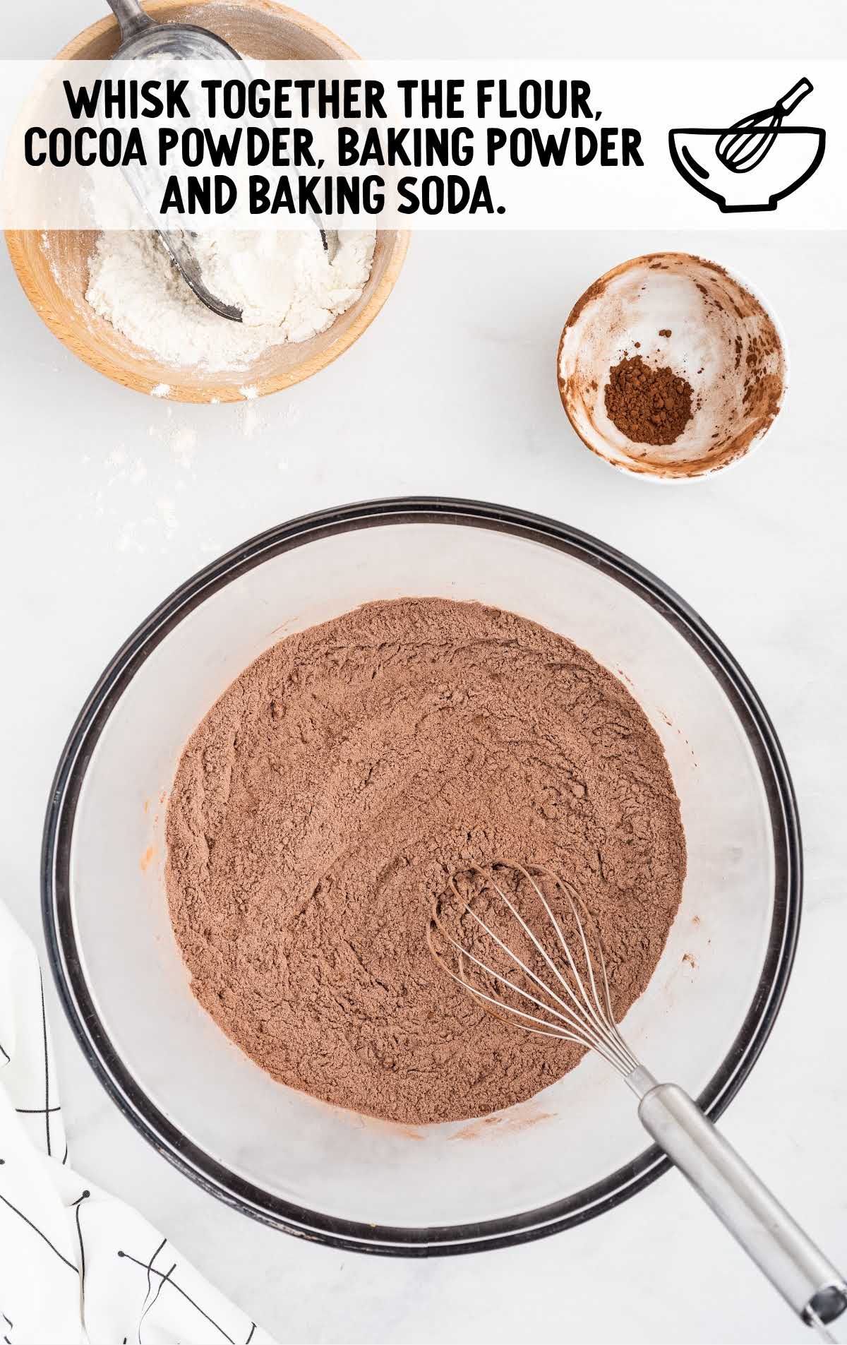 flour, cocoa powder, baking powder, and  baking soda whisked together in a bowl