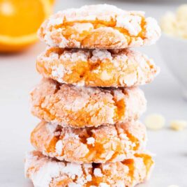 close up shot of Creamsicle Cookies stacked on top of each other