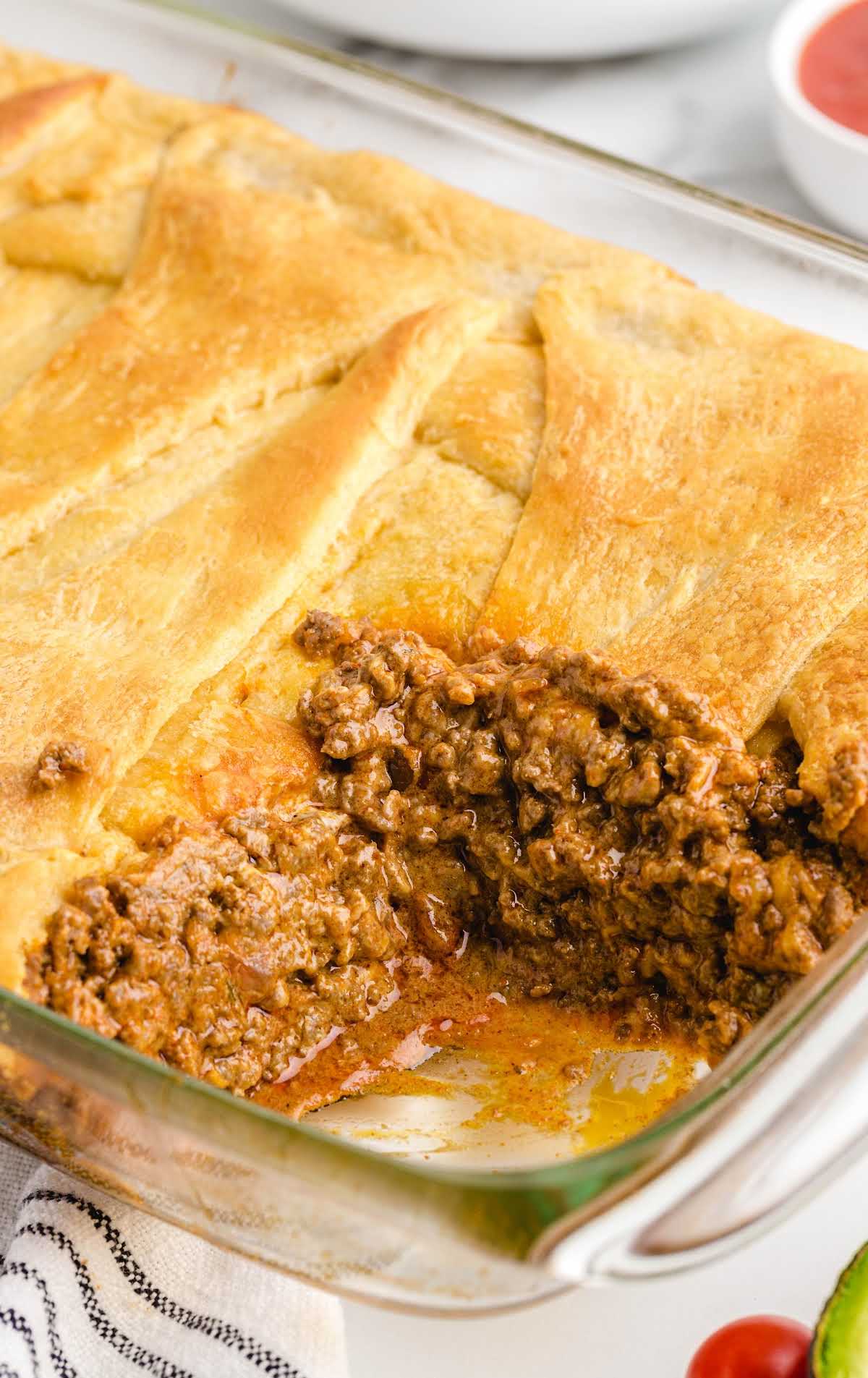 close up shot of Crescent Roll Taco Bake in a baking dish