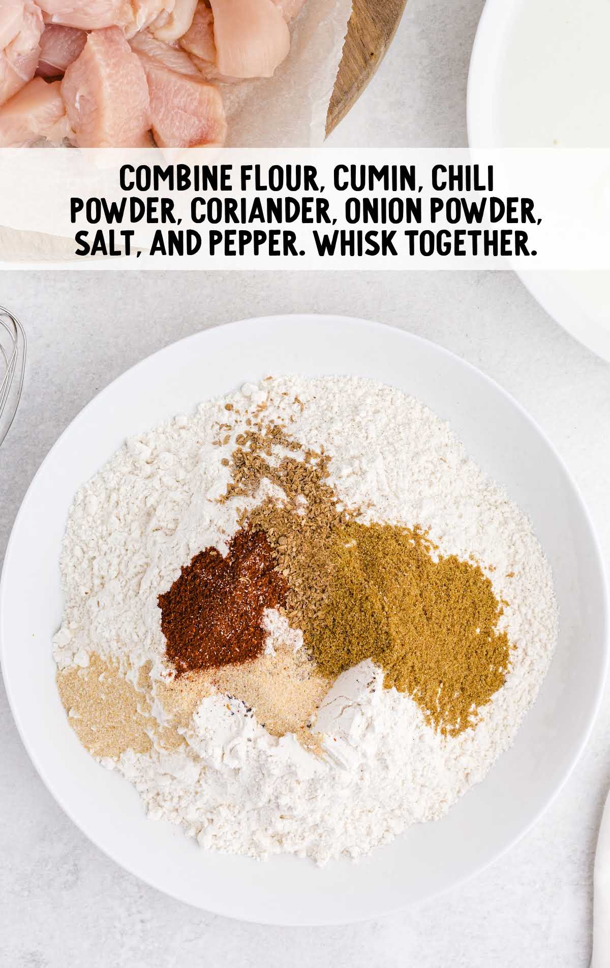 flour, cumin, chili powder, coriander, onion powder, salt and pepper whisked together