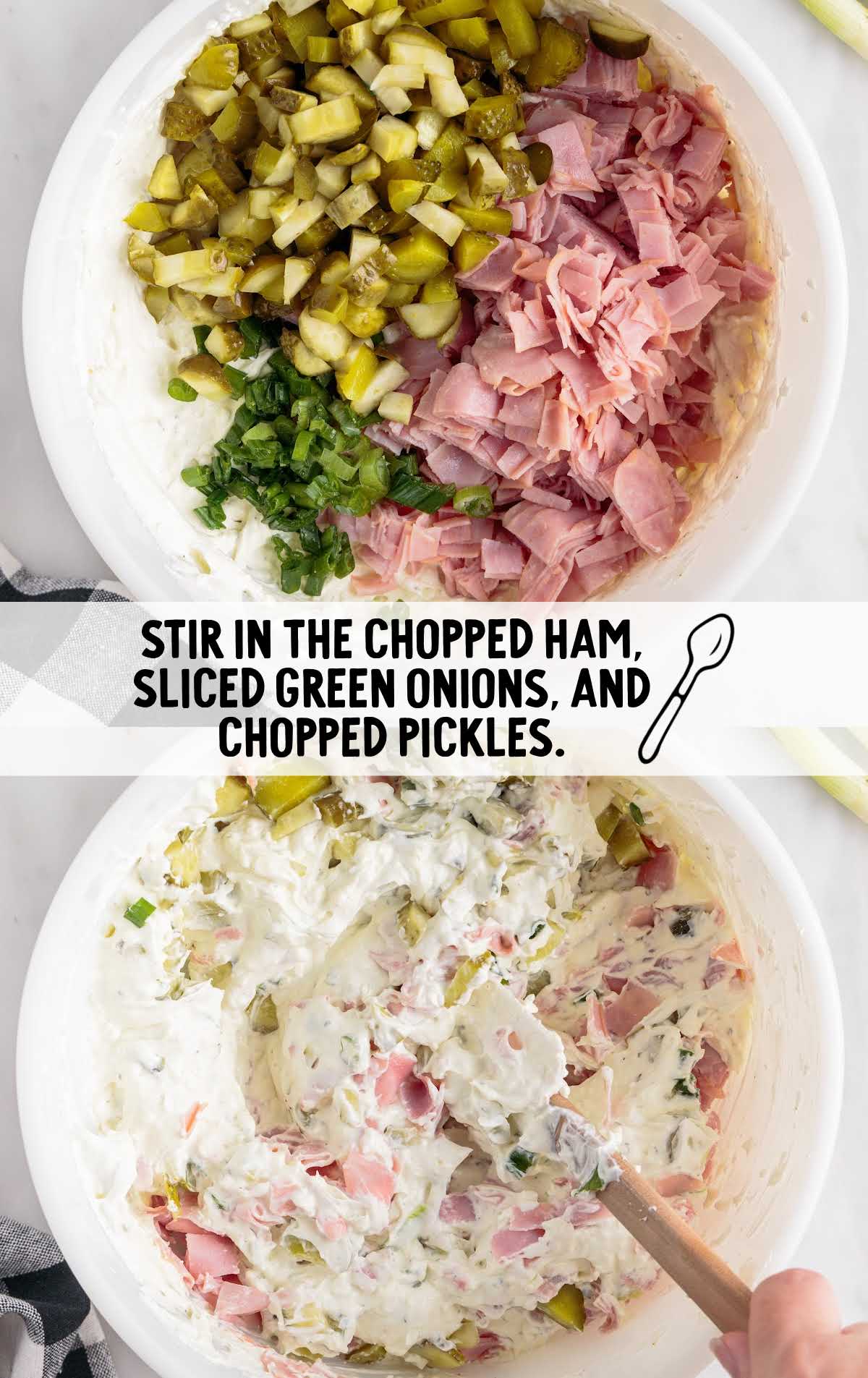 chopped deli ham, sliced green onions, and chopped pickles being folded together in a bowl