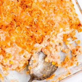 close up overhead shot of Doritos Cheesy Chicken Casserole in a casserole dish