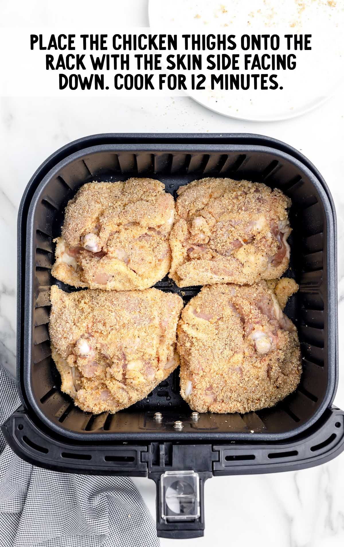 chicken thighs placed in a air fryer