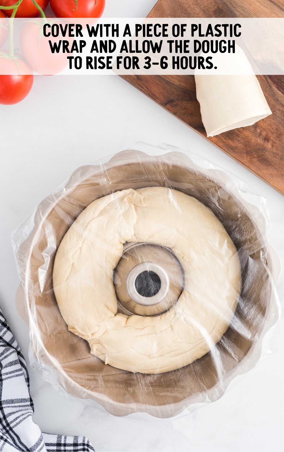 Party Sub process shot of plastic wrap placed on top of the bundt pan