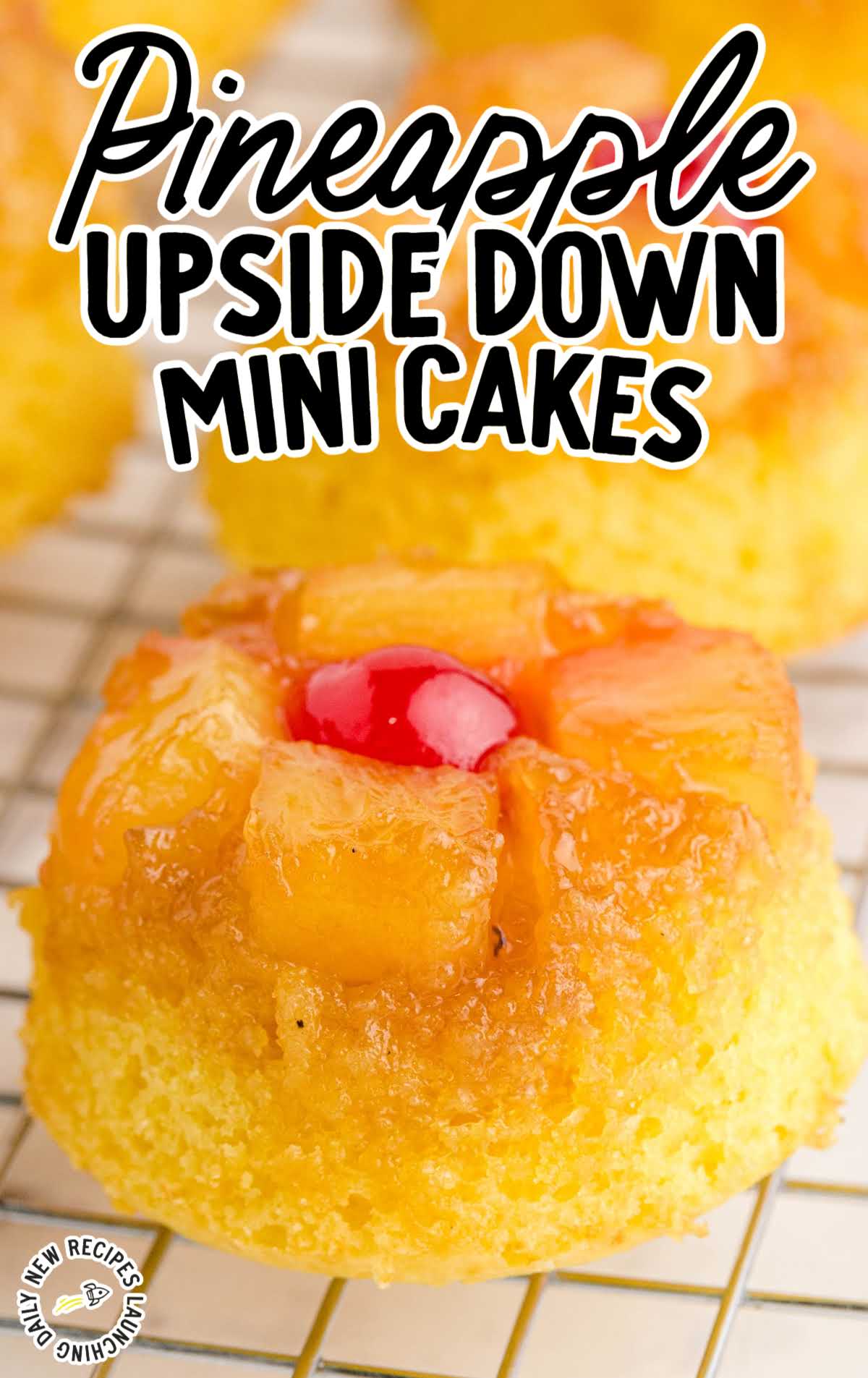 close up shot of a Pineapple Upside Down Mini Cake on a cooling rack