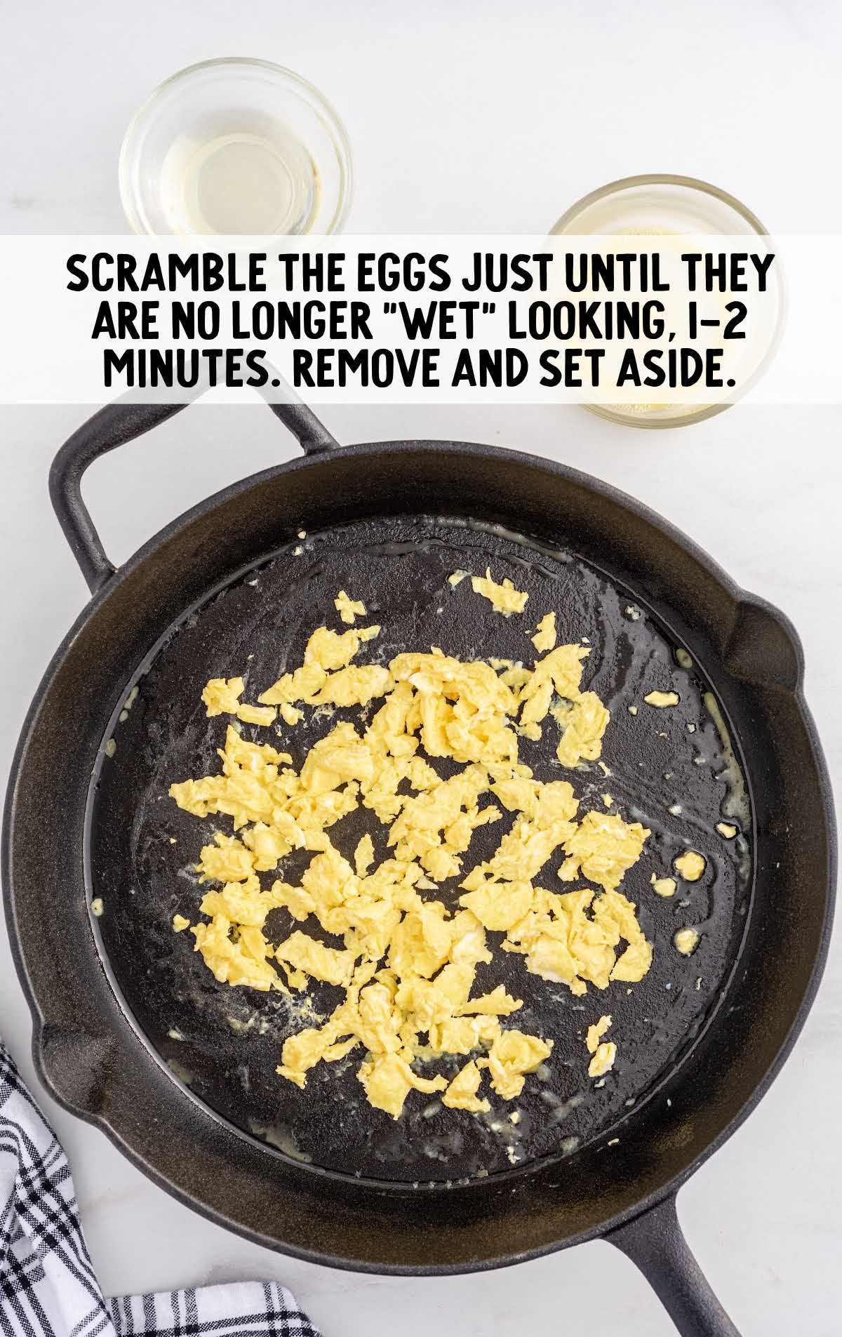 eggs scrambled and cooked on a skillet