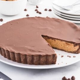 a Reese's Peanut Butter Cup Pie with a slice taken out of it