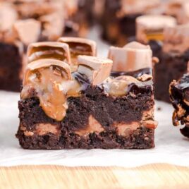 close up shot of Rolo Stuffed Brownies on a wooden board