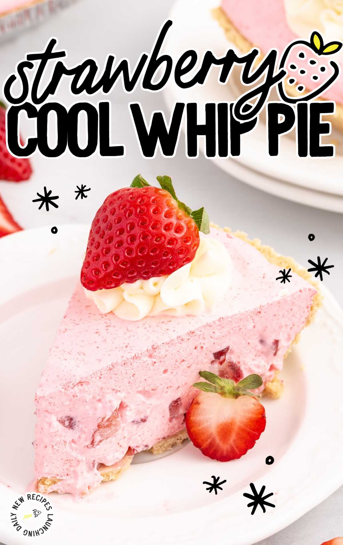 close up shot of a slice of Strawberry Cool Whip Pie topped with whipped cream and strawberries on a plate