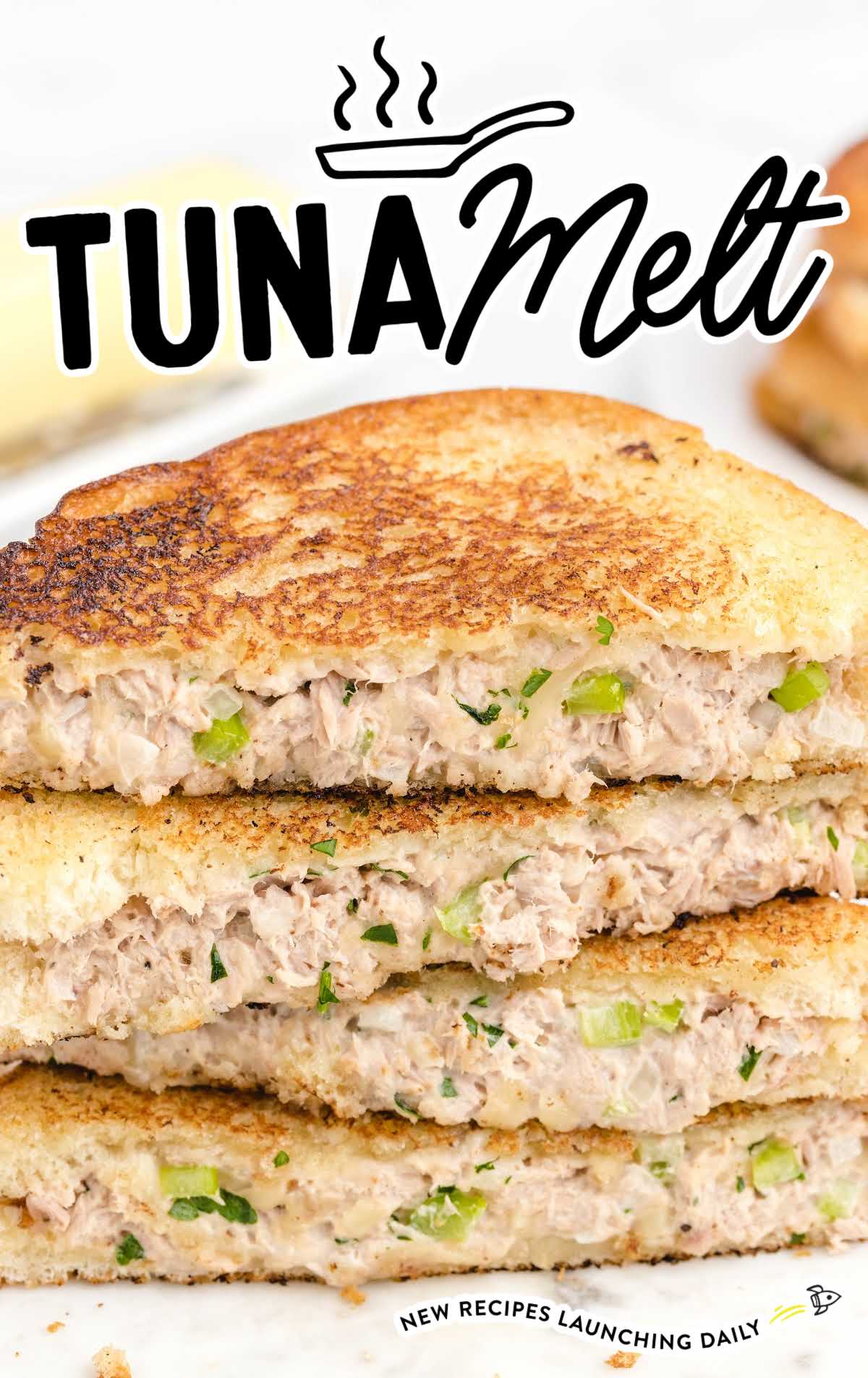 close up shot of Tuna Melt sandwiches stacked on top of each other