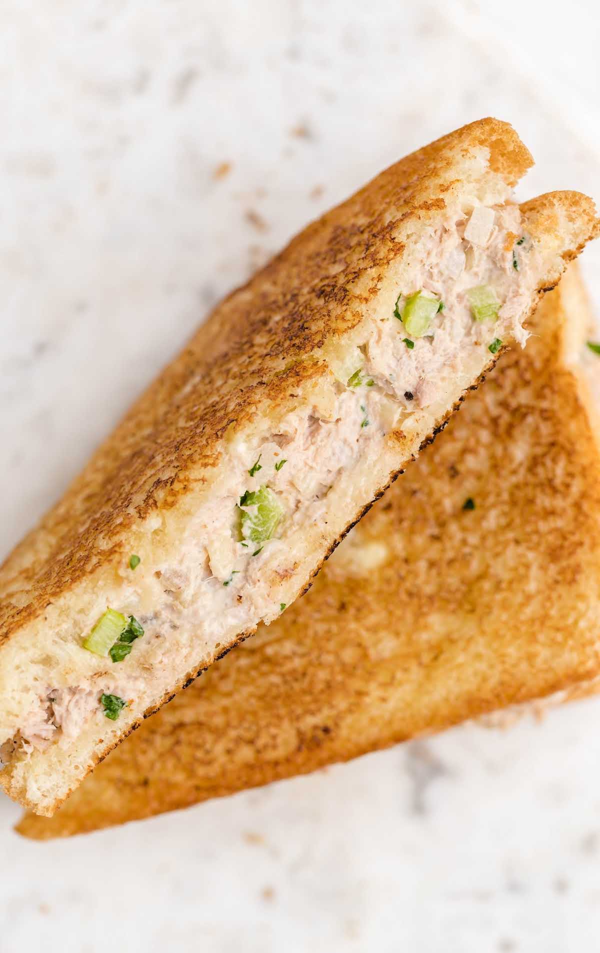 close up overhead shot of slices of Tuna Melt sandwiches