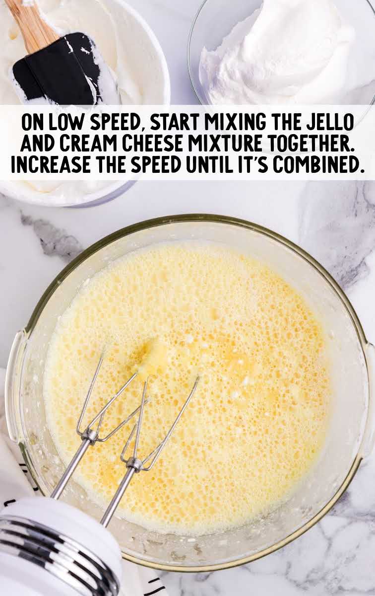 lemon fluff process shot of ingredients blended together in a bowl