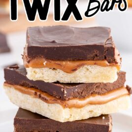 close up shot of a plate of twix bars stacked on top of each other