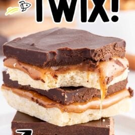 close up shot of a plate of twix bars stacked on top of each other