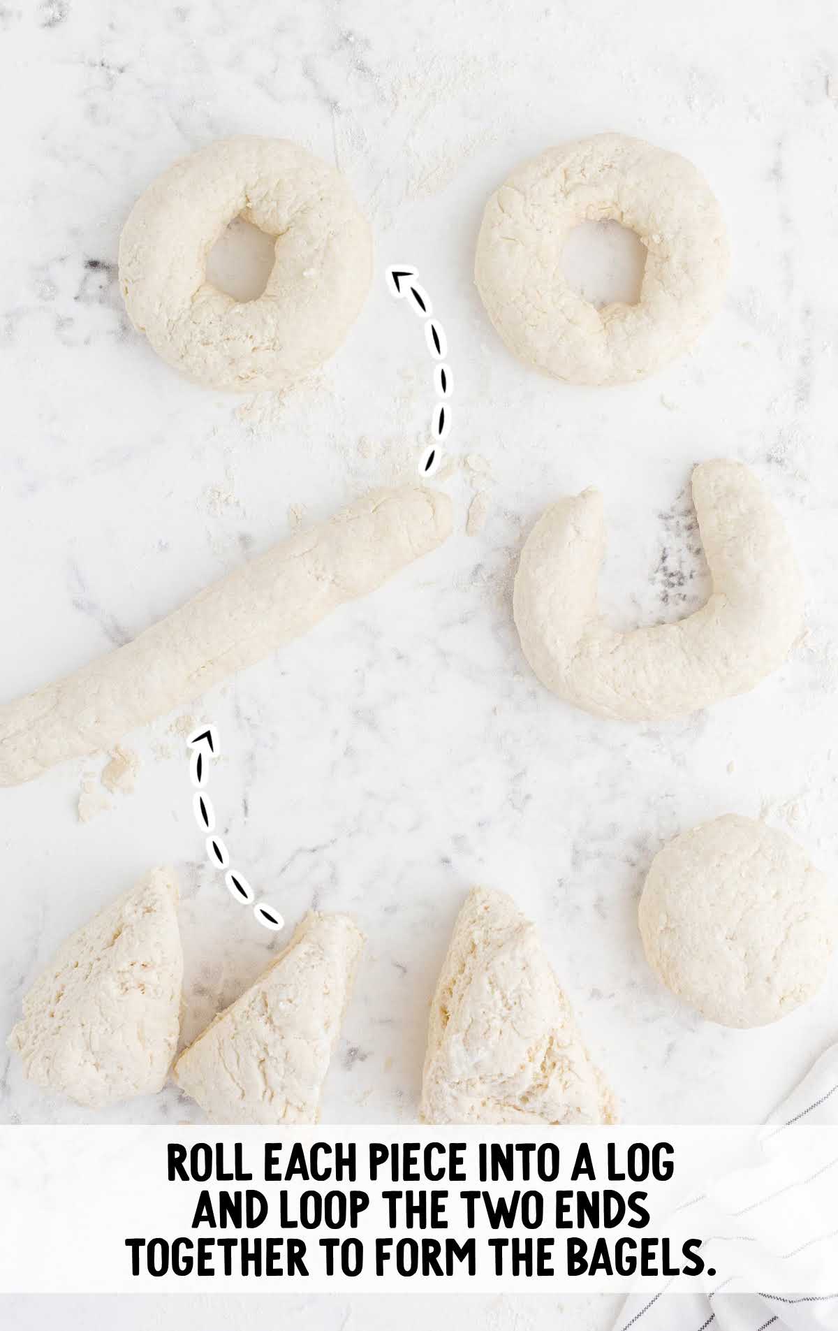 dough formed into logs then looped together at the end to form the shape of a bagel