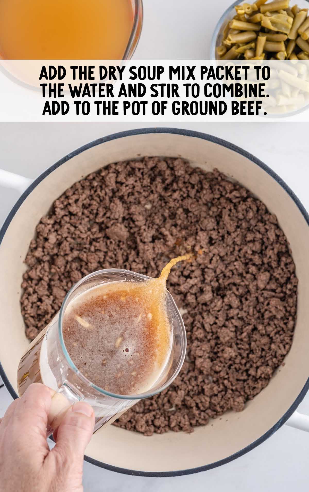 dry soup mix and water added to the pot of cooked ground beef