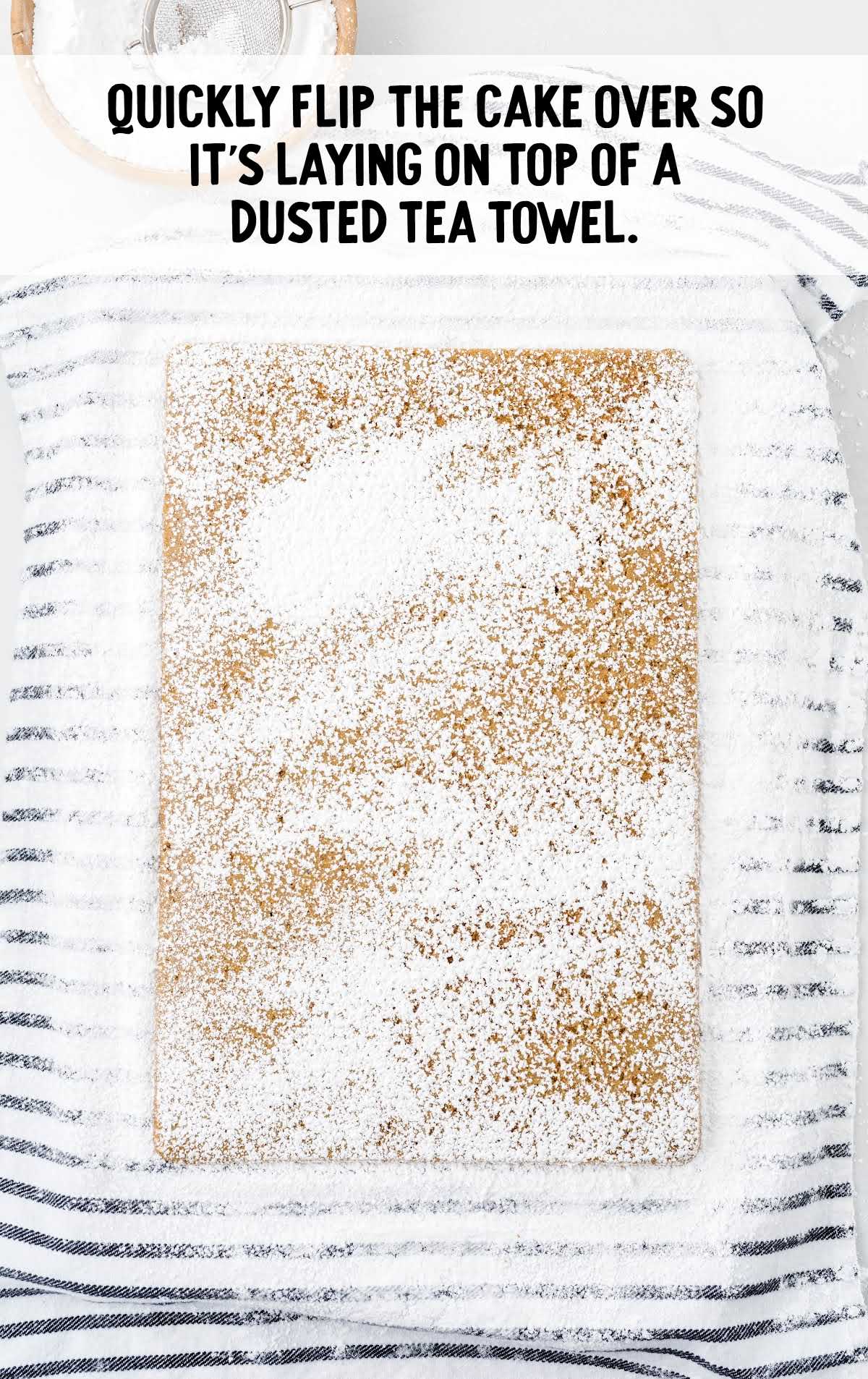 caked dusted with flour on a tea towel