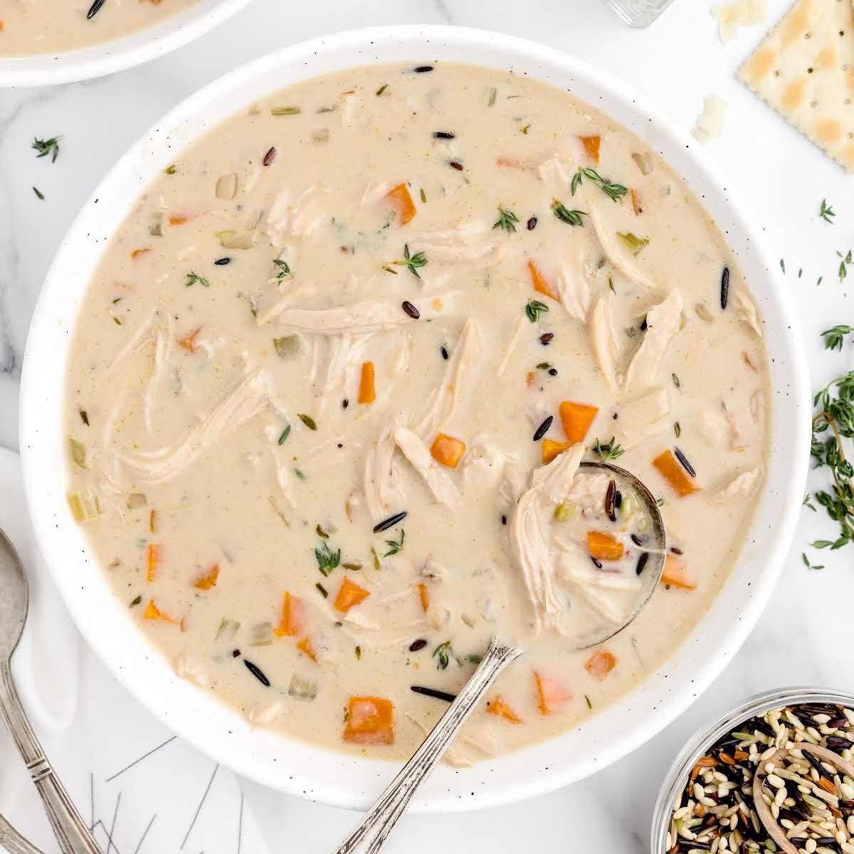 overhead shot of a bowl full of soup with a spoon