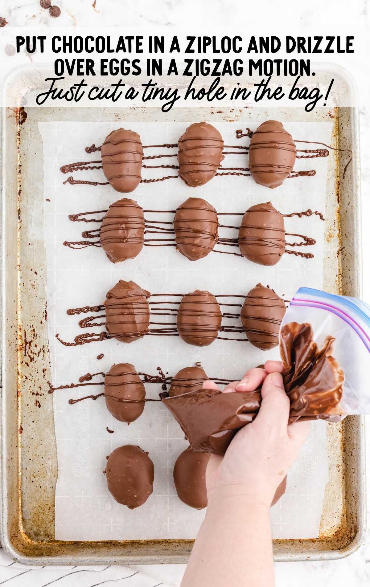 melted chocolate being drizzled onto the edible chocolate eggs