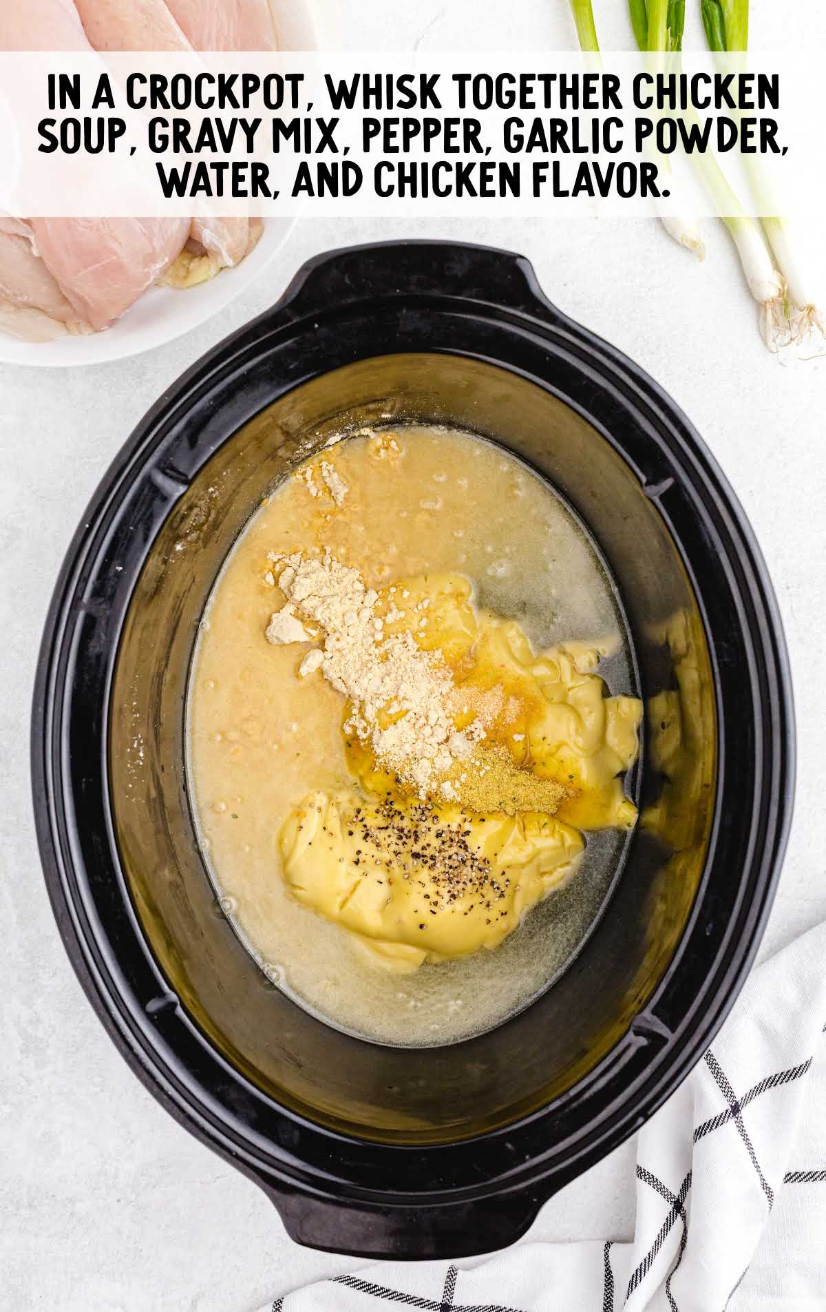 ingredients placed at the bottom of a crockpot