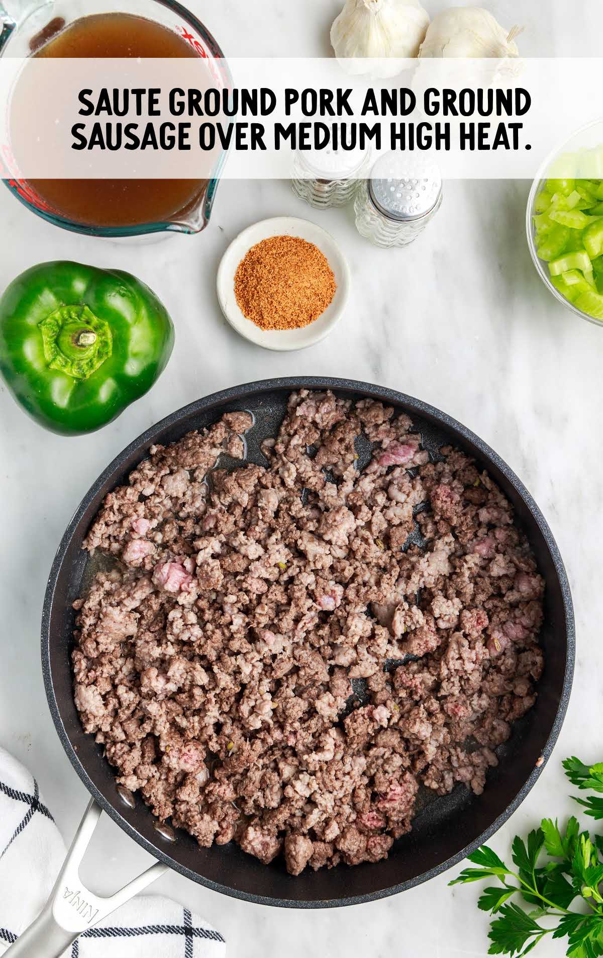 ground pork and sausage cooked in a skillet