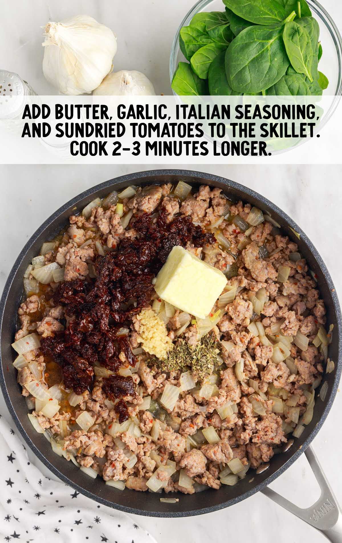 ingredients added to the sausage mixture in a skillet