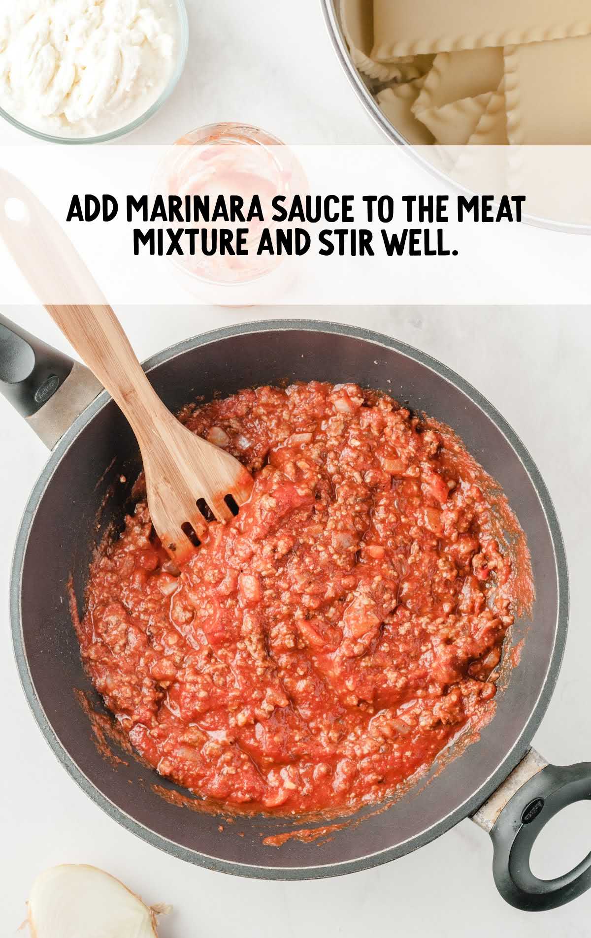 marinara sauce added to the skillet of meat mixture