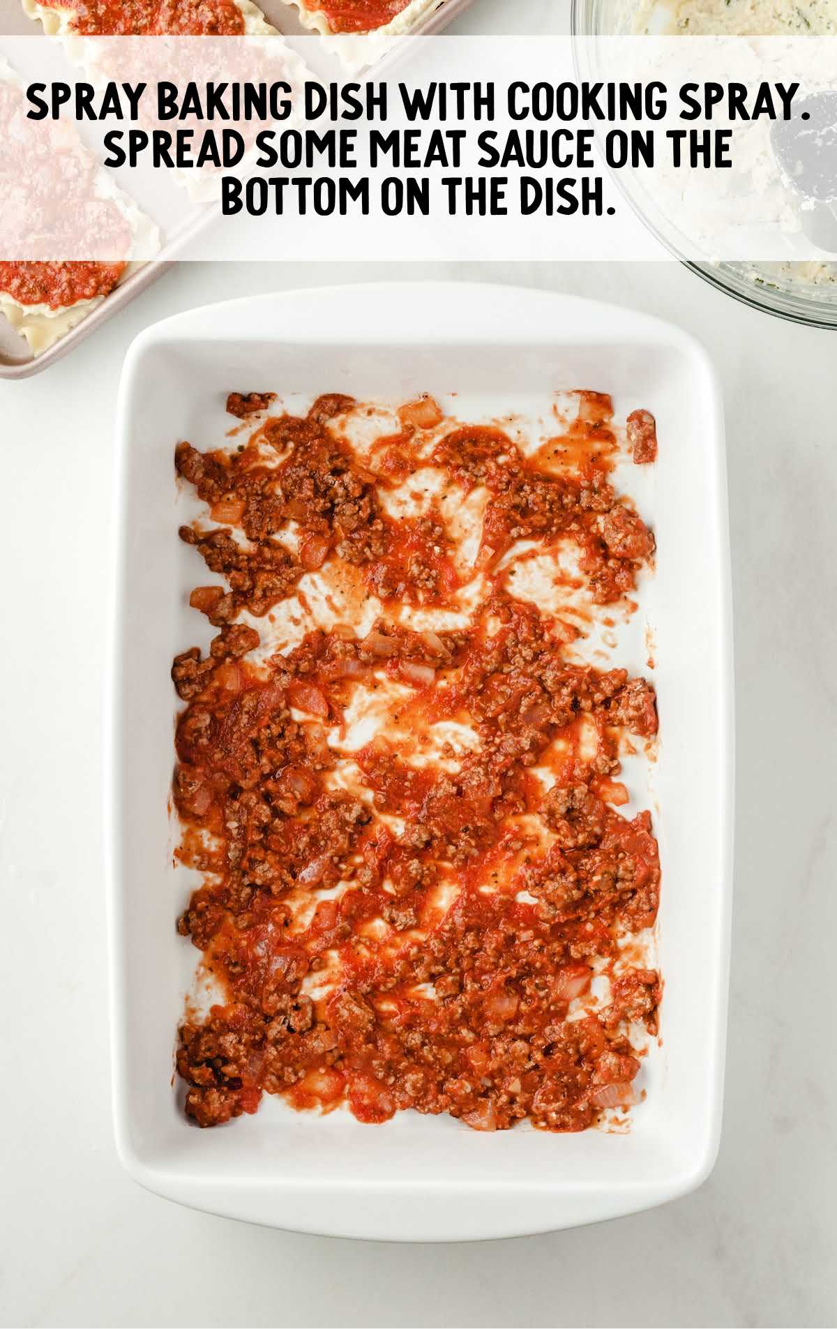meat sauce added to the bottom of a baking dish