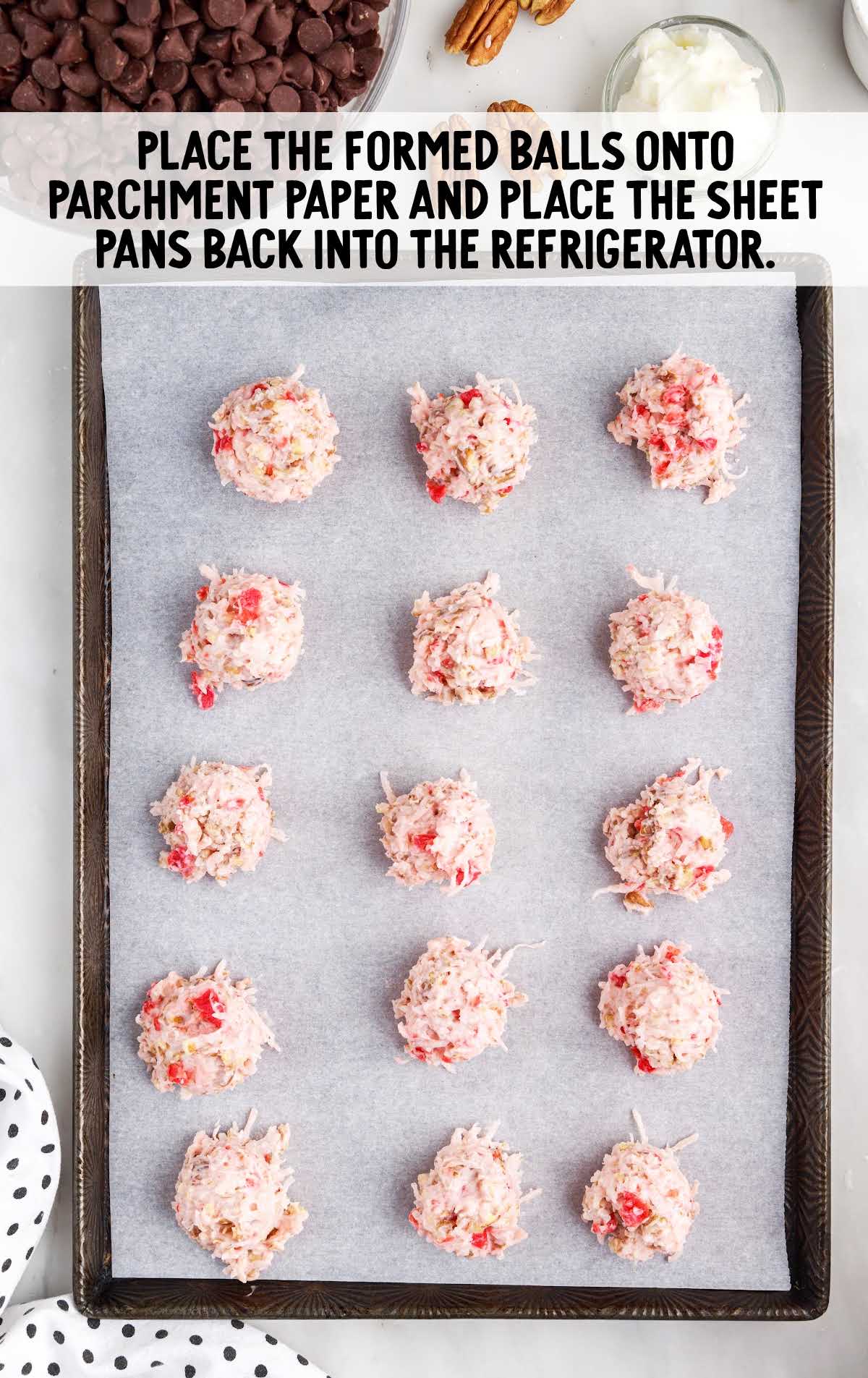 candy balls placed on a baking sheet
